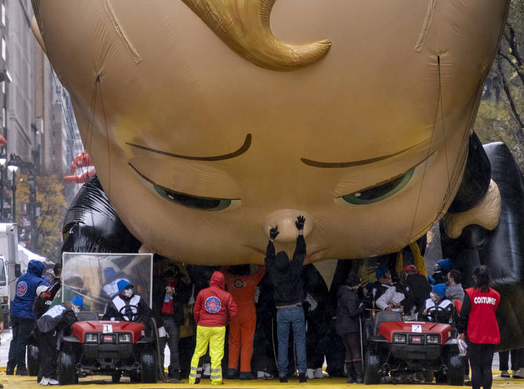 ASSOCIATED PRESS
                                The Boss Baby balloon is deflated as it ends its appearance during the modified Macy’s Thanksgiving Day Parade in New York.