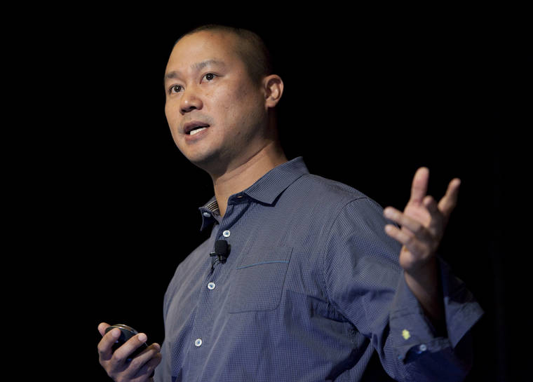 ASSOCIATED PRESS / 2013
                                Tony Hsieh speaks during a Grand Rapids Economic Club luncheon in Grand Rapids, Mich.
