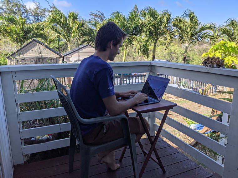 MARLEY C. ALFORD VIA AP
                                Raymond Berger, a New York City software engineer, works remotely on Nov. 22 in Kahului. Hawaii leaders are trying to attract people like Berger to work remotely from Hawaii during the pandemic.