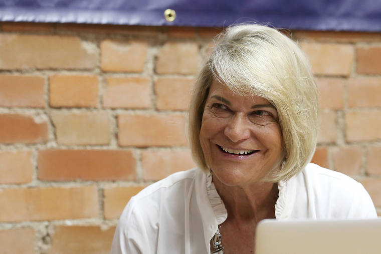 MICHAEL CUMMO/THE WYOMING TRIBUNE EAGLE VIA AP / AUG. 18
                                Republican U.S. Senate candidate Cynthia Lummis smiles during her primary election watch party at her campaign headquarters in Cheyenne, Wyo.