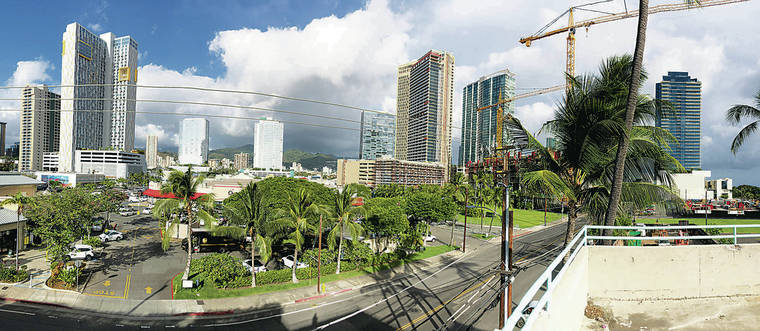 CRAIG T. KOJIMA / CKOJIMA@STARADVERTISER.COM
                                At the master-planned Kakaako community of Ward Village, a cluster of affordable condominium buildings is shown on the left. On the right, four luxury condominium towers — Waiea, Anaha, Ae‘o and ‘A‘ali‘i — surround construction cranes building a fifth luxury tower, Ko‘ula, and stand considerably apart from the moderate-price tower Ke Kilohana at left, with yellow accents, close to a low-income rental tower on state land. Plans for a second moderate-price tower makai of Ke Kilohana have given rise to the issue of how affordable housing is separated from or integrated with higher-price homes in the growing urban area.