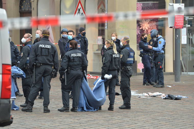 ASSOCIATED PRESS
                                A street is blocked by the police in Trier, Germany, today. German police say people have been killed and several others injured in the southwestern German city of Trier when a car drove into a pedestrian zone. Trier police tweeted that the driver had been arrested and the vehicle impounded.