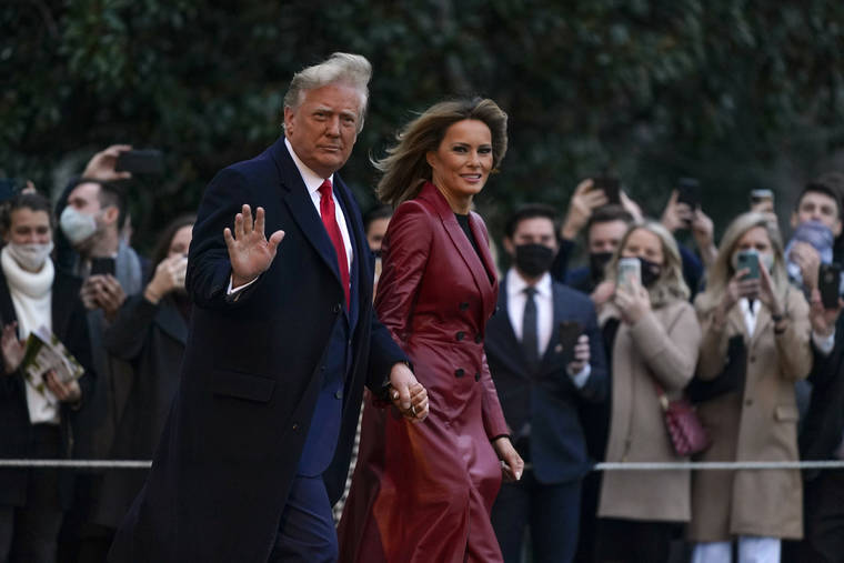ASSOCIATED PRESS
                                President Donald Trump and first lady Melania Trump walk on the South Lawn of the White House in Washington, before boarding Marine One for a short trip to Andrews Air Force Base, Md. Trump is en route to Georgia for a rally for U.S. Senate candidates David Perdue and Kelly Loeffler.