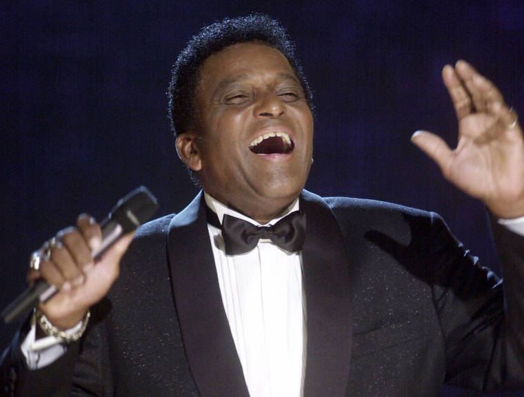 ASSOCIATED PRESS / OCT. 4
                                Charley Pride performs during his induction into the Country Music Hall of Fame at the Country Music Association Awards show at the Grand Ole Opry House in Nashville, Tenn. Pride, the son of sharecroppers in Mississippi and became one of country music’s biggest stars and the first Black member of the Country Music Hall of Fame, has died at age 86. Pride died in Dallas of complications from Covid-19, according to Jeremy Westby of the public relations firm 2911 Media.