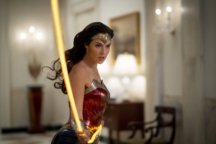 WARNER BROS. VIA AP
                                This image released by Warner Bros. Entertainment shows Gal Gadot in a scene from “Wonder Woman 1984.” The superhero sequel earned an estimated $38.5 million in ticket sales from international theaters, Warner Bros. said today.