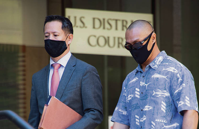 CRAIG T. KOJIMA / CKOJIMA@STARADVERTISER.COM
                                Bobby Nguyen, right, was sentenced Tuesday by Chief U.S. District Judge J. Michael Seabright at the Federal Building in Honolulu.