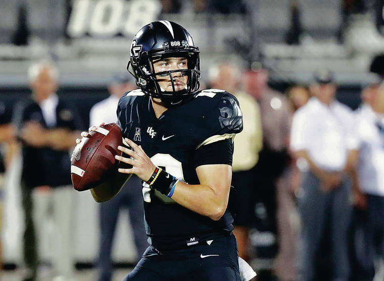 ASSOCIATED PRESS
                                <strong>McKenzie Milton</strong>: <em>Plans to continue comeback in Tallahasee, Fla.</em>