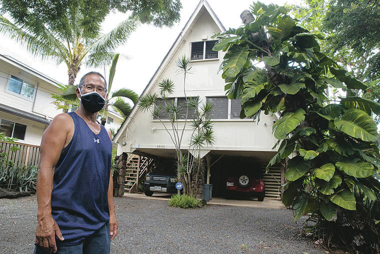 GEORGE F. LEE / OCT. 23
                                Hawaii’s vacation rental industry has been hit especially hard at times by COVID-19 restrictions. Property manager Darryl Pang is on hand to show the legal vacation rental belonging to Michel Rubini near Sharks Cove that is known as the Sunset Beach House.