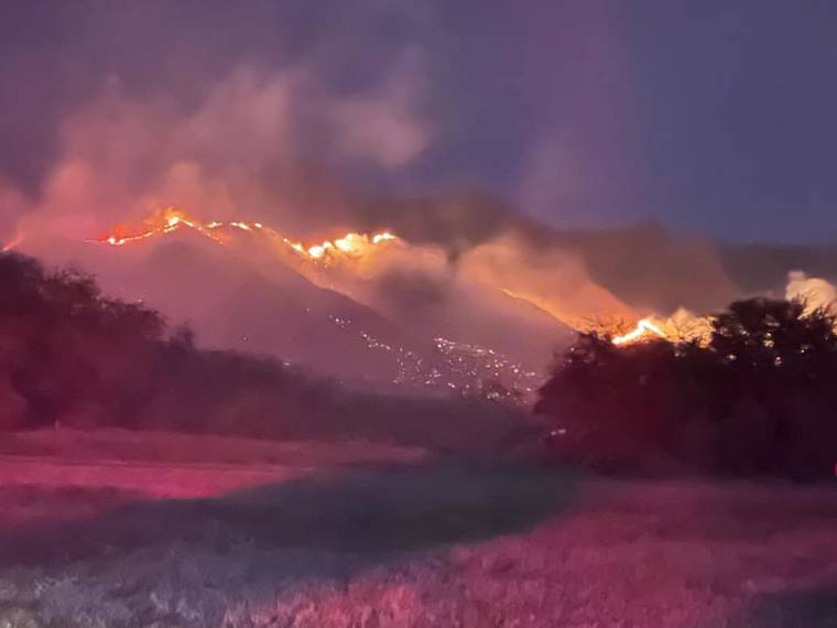 COURTESY MAUI COUNTY
                                The photo from Maui County officials shows an Olowalu brush fire Saturday night. Firefighters had the blaze 90% contained by this morning.