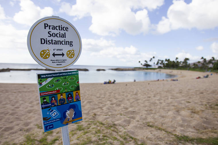 CINDY ELLEN RUSSELL / CRUSSELL@STARADVERTISER.COM
                                Posts with COVID-19 safety measures have been placed around Lagoon 4 at Ko Olina as seen on Thursday.