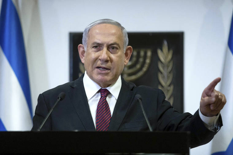 ASSOCIATED PRESS / DEC. 22
                                Israeli prosecutors today released an amended indictment spelling out detailed charges against Israeli Prime Minister Benjamin Netanyahu in a corruption case in which he is accused of trading favors with a powerful media mogul.