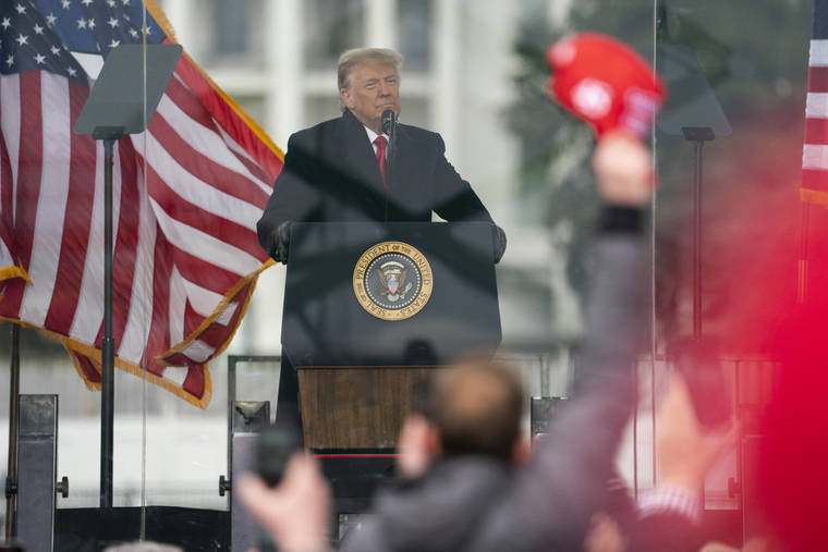 ASSOCIATED PRESS
                                President Donald Trump speaks during a rally protesting the electoral college certification of Joe Biden as president Wednesday in Washington.