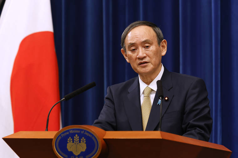 RODRIGO REYES MARIN/POOL PHOTO VIA ASSOCIATED PRESS
                                Japan’s Prime Minister Yoshihide Suga spoke during a press conference at the prime minister’s official residence, Wednesday, in Tokyo, Japan. Suga announced that Japan has expanded a coronavirus state of emergency for seven more prefectures Wednesday, affecting more than half the population amid a surge in infections across the country.