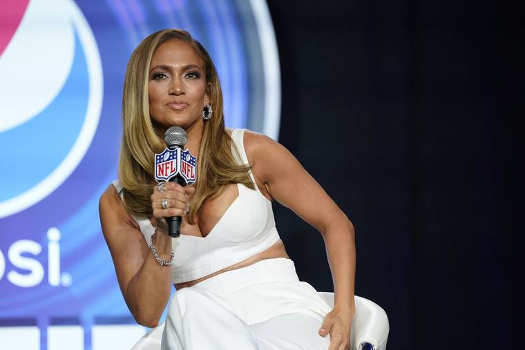 ASSOCIATED PRESS
                                NFL Super Bowl 54 football game halftime performer Jennifer Lopez answers questions at a news conference in Miami on Jan. 30.