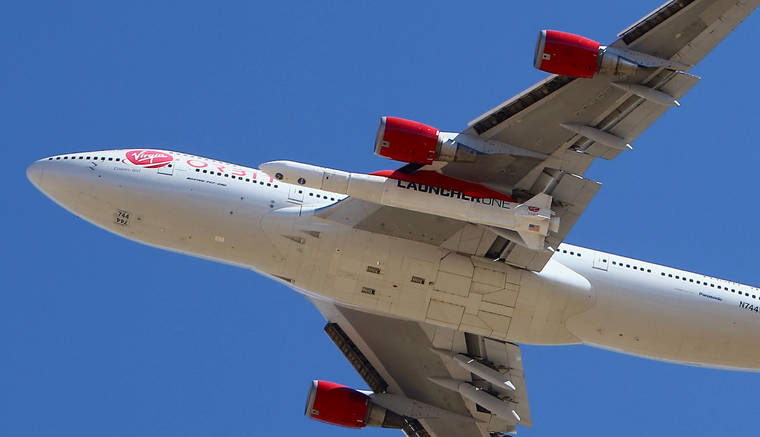 ASSOCIATED PRESS
                                Virgin Orbit Boeing 747-400 rocket launch platform, named Cosmic Girl, takes off today from Mojave Air and Space Port, Mojave on its second orbital launch demonstration in the Mojave Desert, north of Los Angeles.