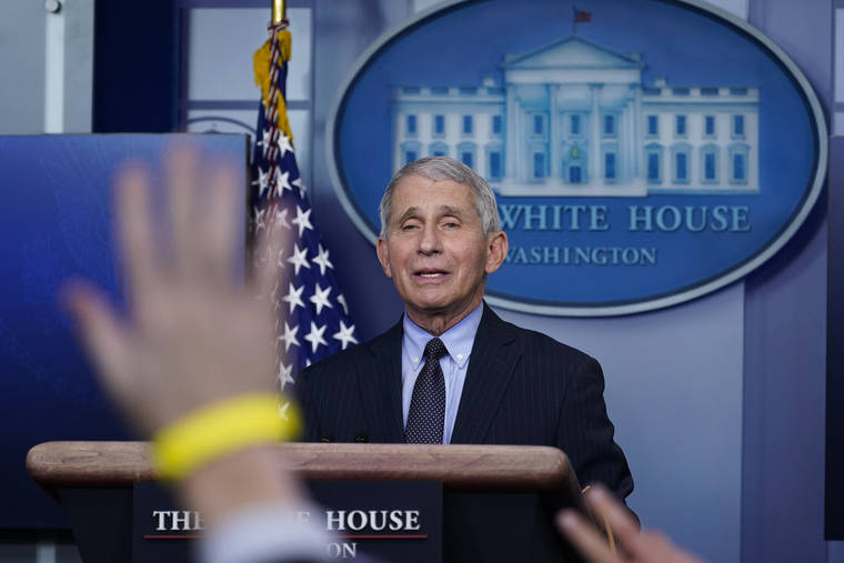 ASSOCIATED PRESS
                                Dr. Anthony Fauci, director of the National Institute of Allergy and Infectious Diseases, takes questions as he speaks with reporters in the James Brady Press Briefing Room at the White House today.