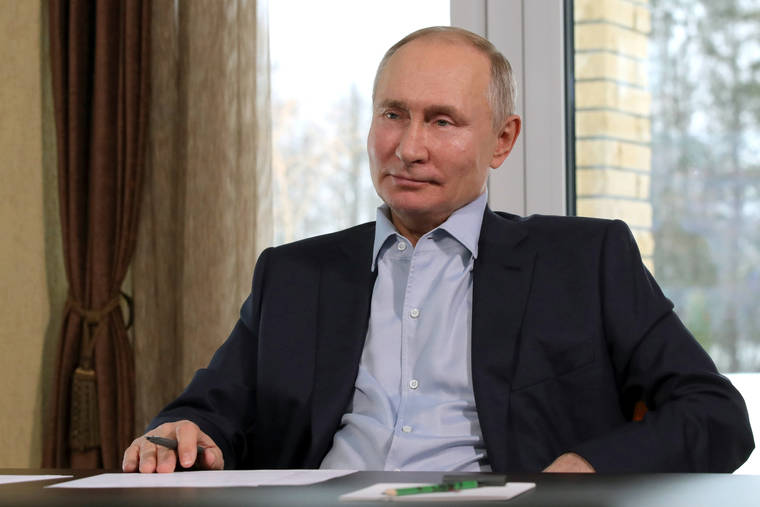 KREMLIN POOL PHOTOVIA AP
                                Russian President Vladimir Putin attends a meeting with university students marking Russian Students’ Day on Monday via video conference in Zavidovo, Russia.
