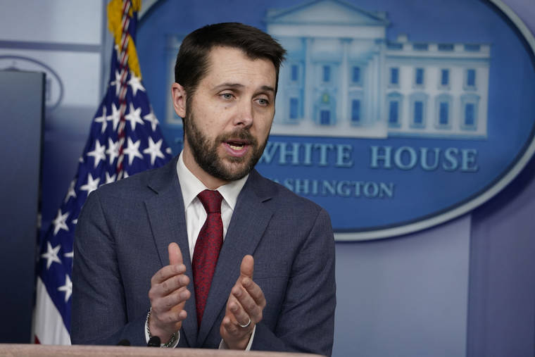 ASSOCIATED PRESS
                                National Economic Council Director Brian Deese speaks during a press briefing at the White House Friday in Washington.