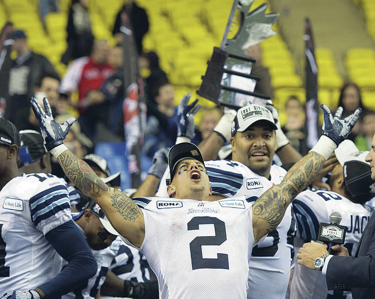 ASSOCIATED PRESS / 2012
                                Chad Owens hosts the “The CO2 RUN DWN,” the Honolulu Star-Advertiser’s new Facebook Live sports talk show. Owens is shown here celebrating a Toronto Argonauts’ victory on Nov. 18, 2012, in Montreal.