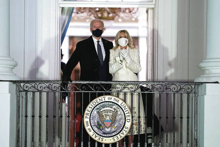 ASSOCIATED PRESS
                                President Joe Biden and first lady Jill Biden watched fireworks from the White House on Wednesday.