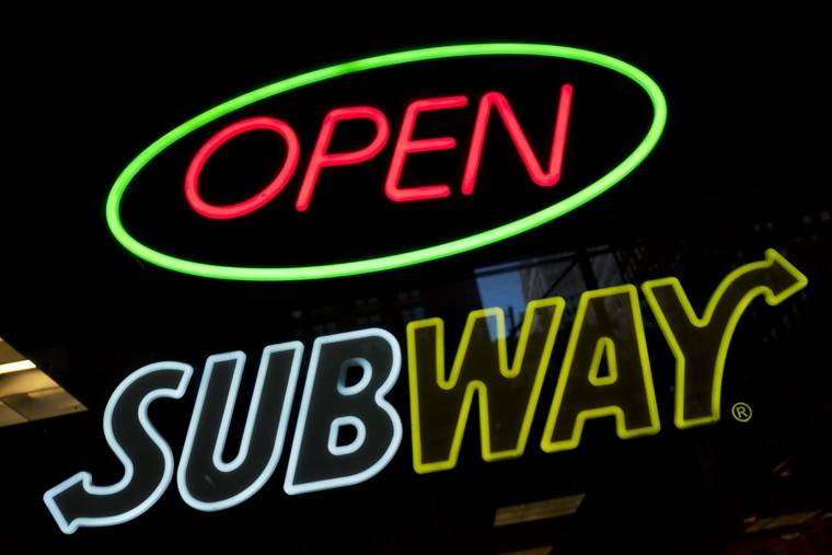 ASSOCIATED PRESS / OCT. 2016
                                A Subway fast-food restaurant’s sign is shown in New York. Two San Francisco Bay Area residents have sued the fast-food chain Subway alleging that its tuna is “anything but tuna” and calling it “tuna salad” constitutes fraud and false advertising.