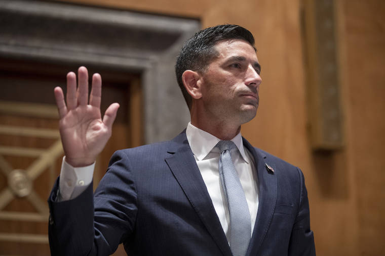 ASSOCIATED PRESS / 2020
                                Acting Secretary of Homeland Security Chad Wolf is sworn in before the Senate Homeland Security and Governmental Affairs committee during his confirmation hearing, on Capitol Hill in Washington.