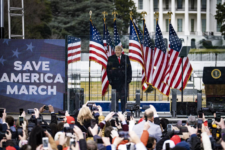 NEW YORK TIMES
                                President Donald Trump addresses a rally protesting the presidential election results on the Ellipse, with the White House in the background, in Washington on Wednesday.