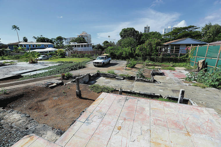 JAMM AQUINO/JAQUINO@STARADVERTISER.COM
                                Above, concrete foundations and remnants of older structures at the residence.