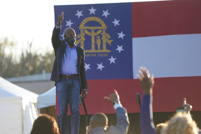 NEW YORK TIMES
                                The Rev. Raphael Warnock, a Democratic candidate for U.S. Senate, during a campaign event at Garden City Stadium in Garden City, Ga., on Sunday.
