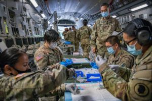 SGT. JOHN SCHOEBEL / U.S. ARMY NATIONAL GUARD PHOTO
                                Hawaii National Guard members assigned to the Medical Detachment prepared to administer COVID-19 vaccines on a C-17 aircraft during Operation New Hope in Hilo on Tuesday. The operation was designed to provide COVID-19 vaccinations in a single day to National Guard members assisting the state with the novel coronavirus in each county.