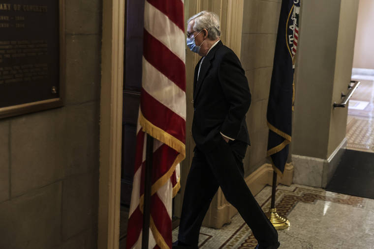 NEW YORK TIMES
                                Senate Minority Leader Mitch McConnell (R-Ky.) walks to his office from the Senate floor at the Capitol in Washington on Wednesday.
