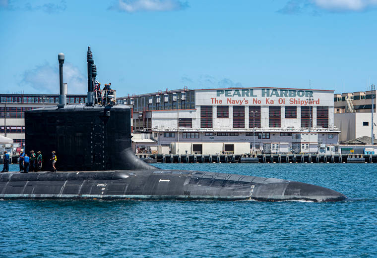 COURTESY U.S. NAVY
                                The Virginia-class fast-attack submarine USS Missouri departs Pearl Harbor Naval Shipyard following maintenance work on May 10.