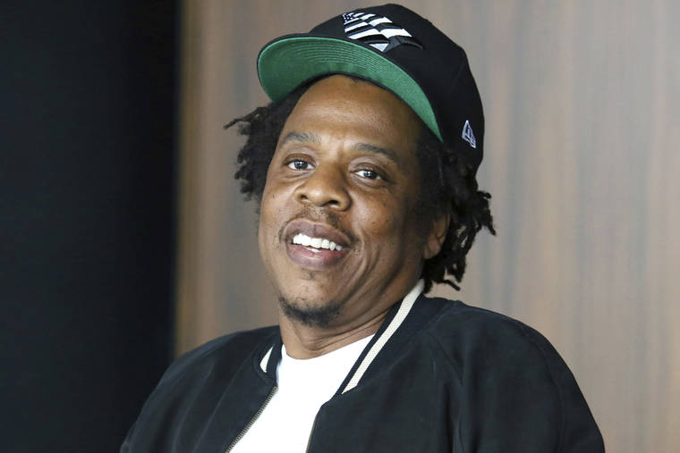 ASSOCIATED PRESS
                                Jay-Z makes an announcement of the launch of Dream Chasers record label in joint venture with Roc Nation, at the Roc Nation headquarters in New York in 2019. Moet Hennessy is acquiring a 50% stake in the rapper and entrepreneur’s Champagne brand, Armand de Brignac, in an effort to up its cool factor and expand sales. Jay-Z, whose real name is Shawn Carter, said the partnership will help Armand de Brignac grow and flourish.