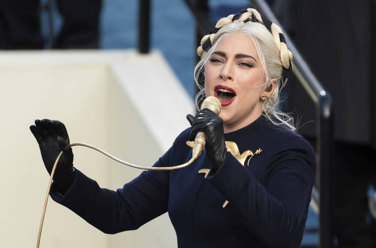 SAUL LOEB/POOL PHOTO VIA ASSOCIATED PRESS
                                Lady Gaga sang the national anthem during President-elect Joe Biden’s inauguration at the U.S. Capitol in Washington, Jan. 20. Officials say Lady Gaga’s dog walker was shot and her two French bulldogs stolen in Hollywood during an armed robbery.