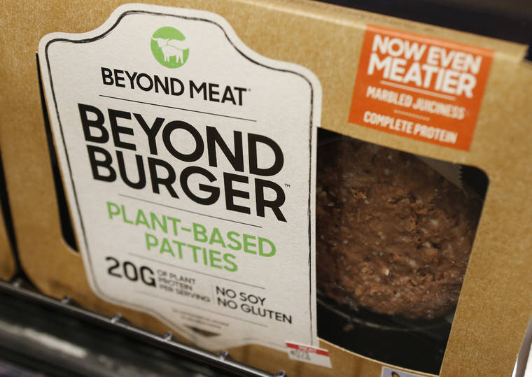 ASSOCIATED PRESS
                                A meatless burger patty called Beyond Burger by Beyond Meat is displayed at a grocery store in Richmond, Va., in 2019. Plant-based food company Beyond Meat will be partnering with several major fast food chains in the coming years to expand offerings that could eventually include plant-based burgers, chalupas or toppings on a stuffed-crust pizza.