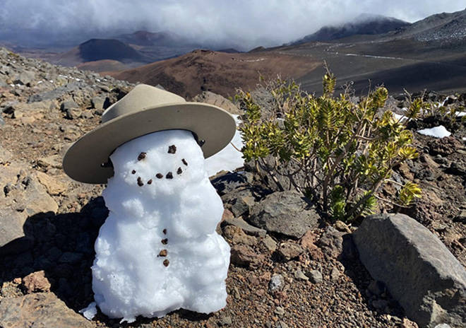 COURTESY HALEAKALA NATIONAL PARK
                                A snowman sports a park ranger’s hat after a rare snowstorm on the summit of Haleakala Wednesday afternoon.