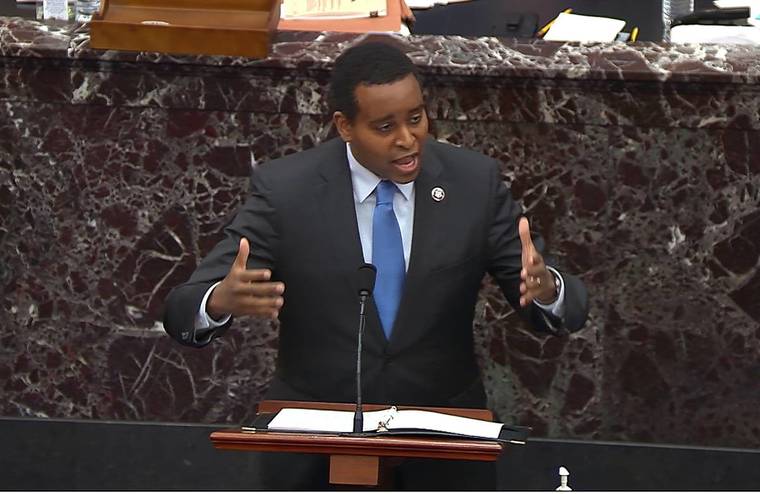 SENATE TELEVISION VIA ASSOCIATED PRESS
                                House impeachment manager Rep. Joe Neguse, D-Colo., spoke during the second impeachment trial of former President Donald Trump in the Senate at the U.S. Capitol in Washington, today.