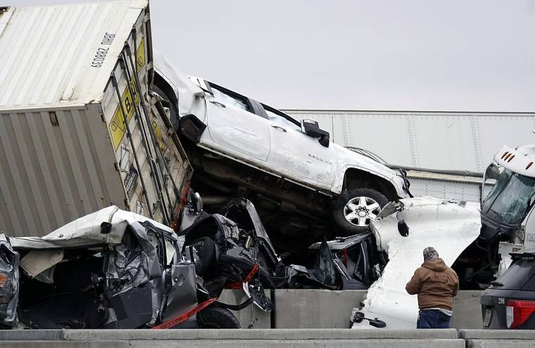 LAWRENCE JENKINS/THE DALLAS MORNING NEWS VIA ASSOCIATED PRESS
                                Vehicles were piled up after a fatal crash on Interstate 35 near Fort Worth, Texas, today. The massive crash involving 75 to 100 vehicles on an icy Texas interstate killed some and injured others, police said.