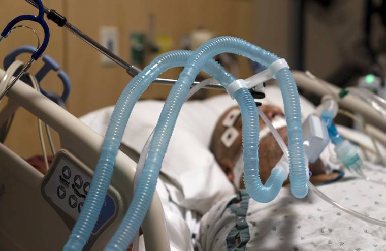 ASSOCIATED PRESS
                                Ventilator tubes were attached to a COVID-19 patient, Nov. 19, at Providence Holy Cross Medical Center in the Mission Hills section of Los Angeles. The U.S. death toll from COVID-19 has topped 500,000 — a number so staggering that a top health researcher says it is hard to imagine an American who hasn’t lost a relative or doesn’t know someone who died.