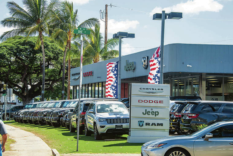 CRAIG T. KOJIMA / CKOJIMA@STARADVERTISER.COM
                                Auto sales in Hawaii in 2020 plunged nearly 20% but are picking up. The Cutter Chrysler Dodge Jeep Ram Fiat dealership at 777 Ala Moana Blvd. with inventory on display.