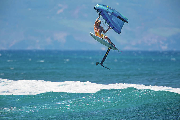 COURTESY ROBBY NAISH
                                In addition to windsurfing, Robby Naish is also a pioneer in the water sport known as foiling, above using a wing to foil the waves on Maui’s North Shore.