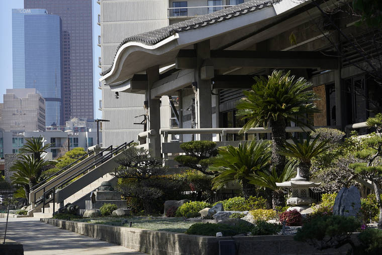 ASSOCIATED PRESS
                                The front entrance of the Higashi Honganji Buddhist Temple was vandalized in Los Angeles, Saturday. Authorities are investigating the vandalism and fire at the Buddhist temple in the Little Tokyo section of downtown Los Angeles.