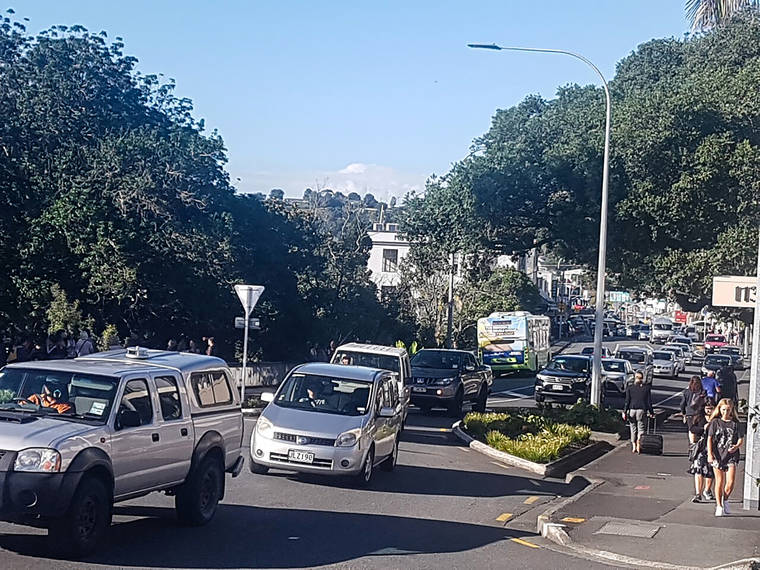 ASSOCIATED PRESS
                                Traffic slowly works up to high ground at Whangarei, New Zealand, as a tsunami warning is issued Friday.