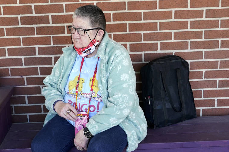 ASSOCIATED PRESS
                                Pat Brown waited outside the Don Bosco Senior Center in Kansas City, Mo., Wednesday. Brown knew she needs the vaccine because her asthma and diabetes put her at higher risk of serious COVID-19 complications.