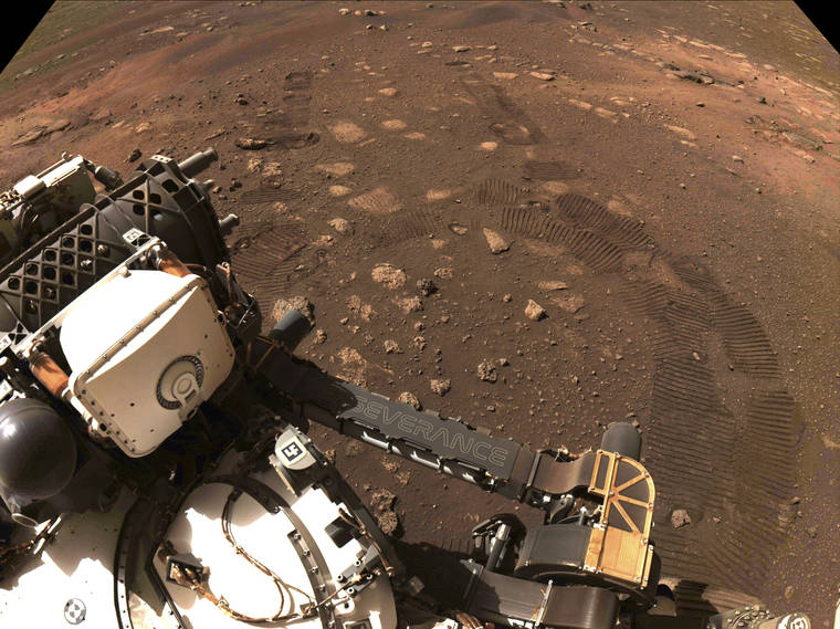 COURTESY NASA/JPL-CALTECH VIA AP
                                The first drive of the Perseverance rover on Mars on Thursday.