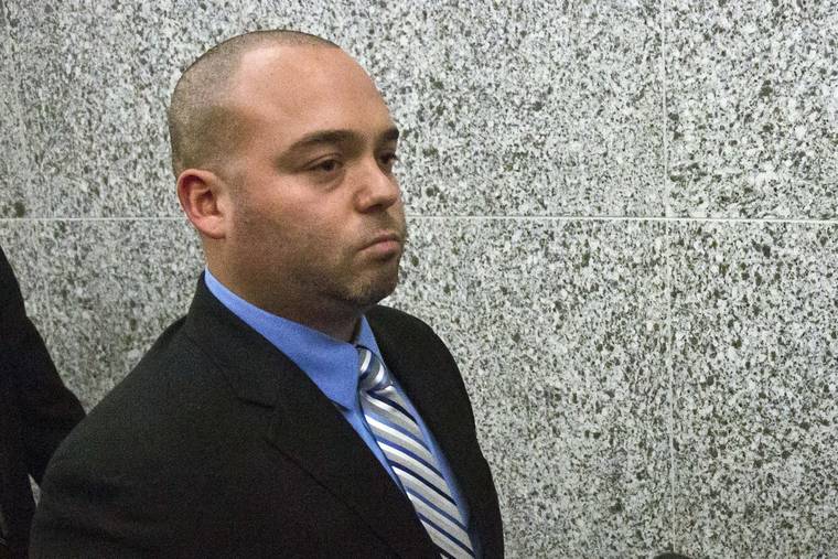 ASSOCIATED PRESS
                                New York City police officer David Afanador leaves state court in New York in 2014 following his arraignment on charges he pistol-whipped a 16-year-old boy during a marijuana bust, breaking two of his teeth.