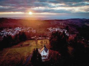ASSOCIATED PRESS
                                The sun sets over the town of Oberreifenberg near Frankfurt, Germany.