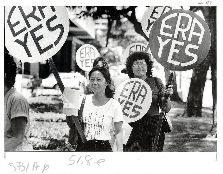 STAR-ADVERTISER FILE
                                Local members of the National Organization for Women showed support for the Equal Rights Amendment in Honolulu in 1984.