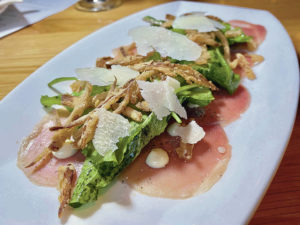NADINE KAM / SPECIAL TO THE STAR-ADVERTISER
                                Highlights from the new 12th Ave Grill menu include ahi carpaccio.