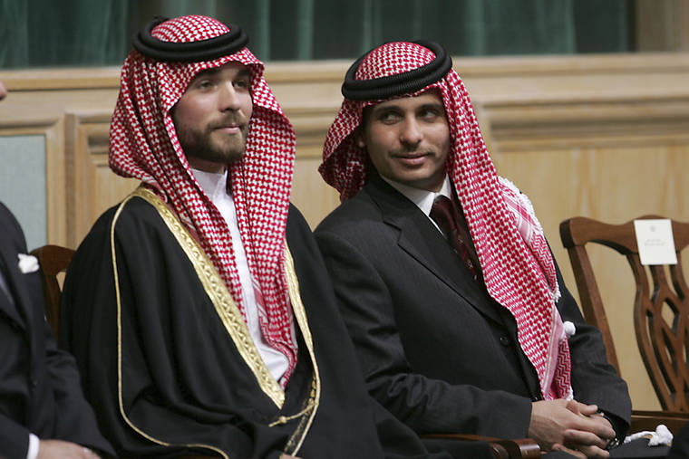 ASSOCIATED PRESS
                                Prince Hamza Bin Al-Hussein, right, and Prince Hashem Bin Al-Hussein, left, brothers King Abdullah II of Jordan, attend the opening of the parliament in Amman, Jordan, in 2006. Prince Hamza, the half-brother of Jordan’s King Abdullah II, said he has been placed under house arrest. in a videotaped statement late Saturday.